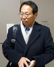 韓国から帰国し、来年２月２日に強化試合を行うことを明言した岡田監督